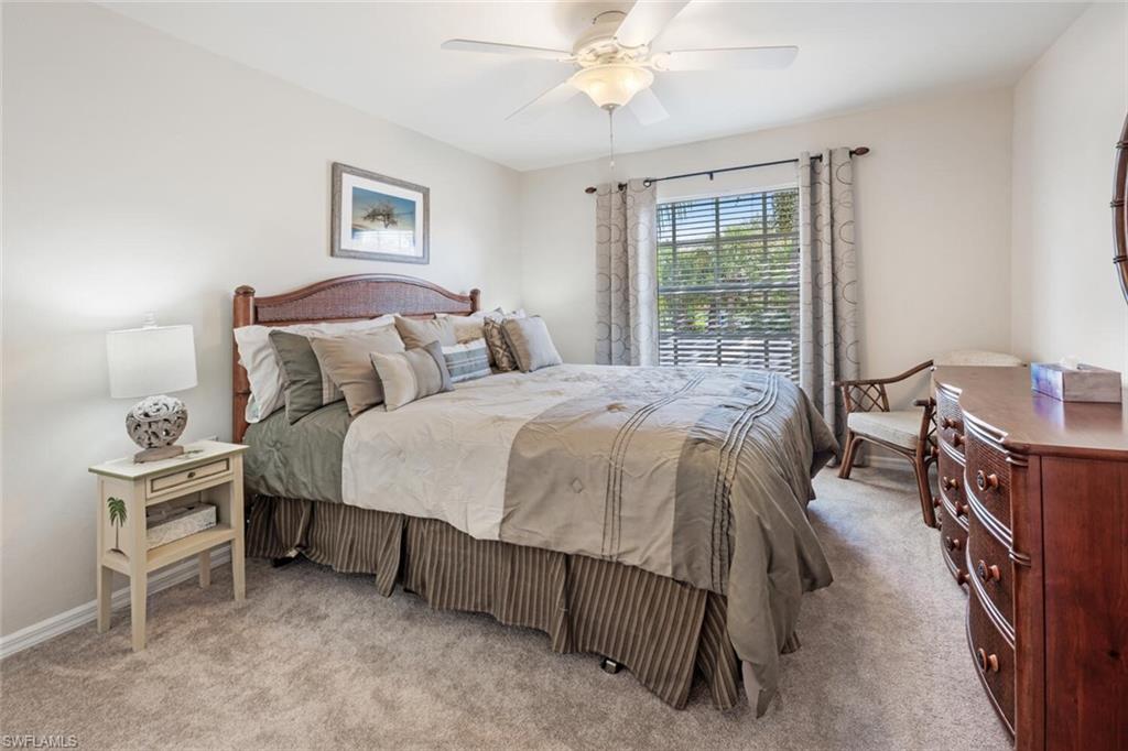 Bedroom featuring carpet flooring and ceiling fan