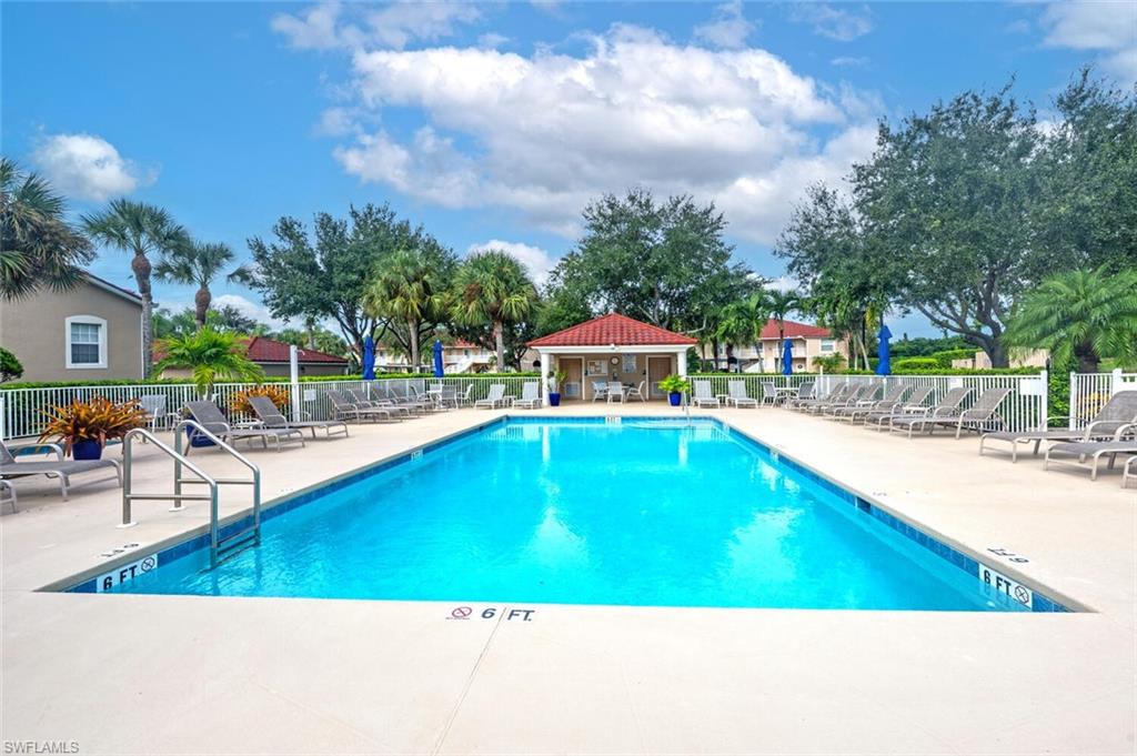Community pool with a patio and a gazebo