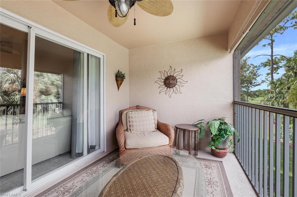 Balcony featuring a ceiling fan