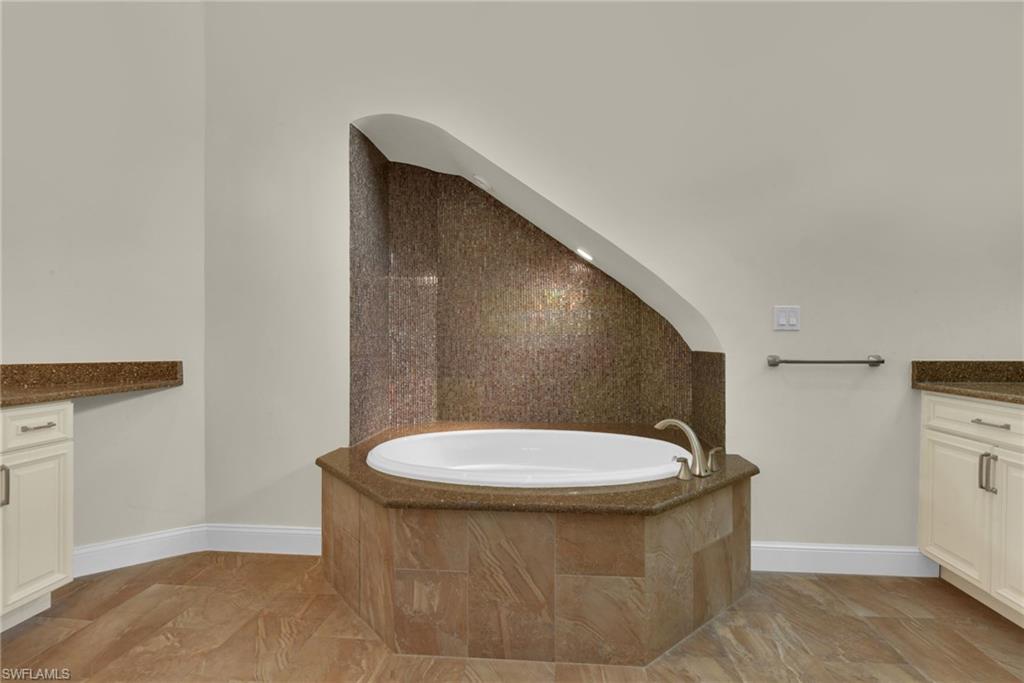Beautiful Glass Tile Above the Tub