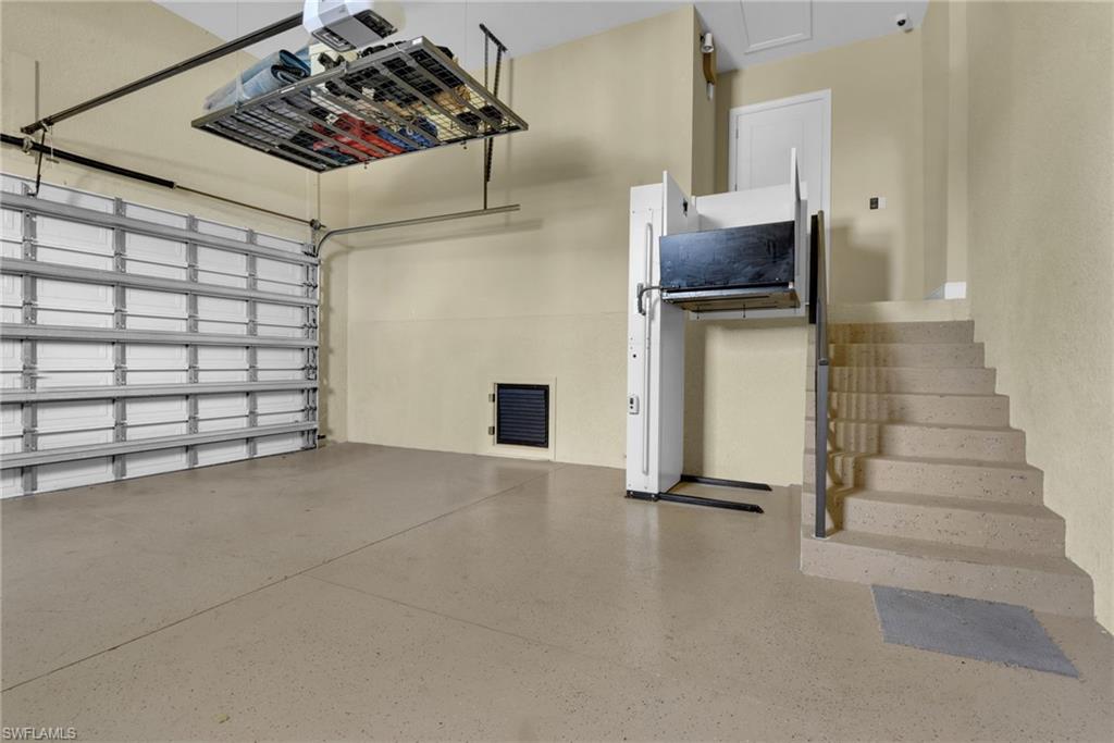 Large garage with electric elevator