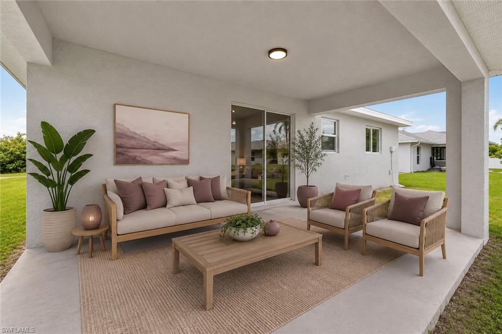 Covered lanai provides the perfect space for outdoor dining, entertaining, or relaxing while enjoying the spacious backyard. [Virtually Staged]