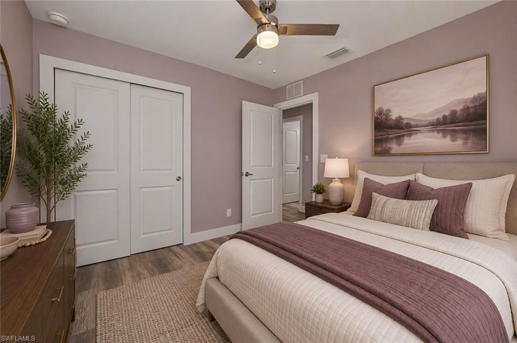 Versatile third bedroom with a spacious closet, luxury vinyl plank flooring, and an ideal layout for guests, a home office, or hobby room. [Virtually Staged]