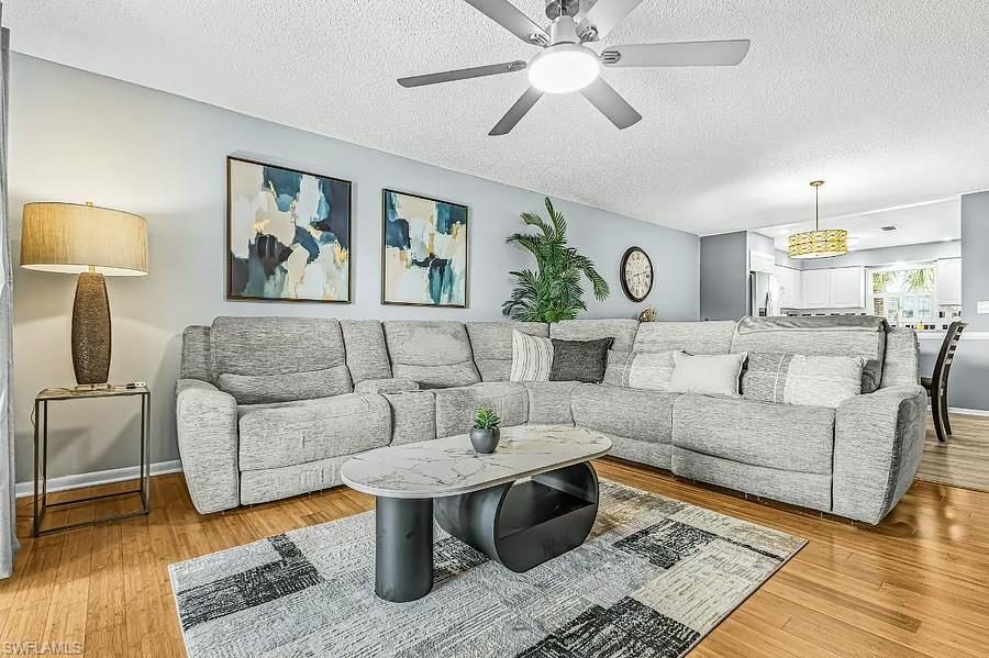 Wood-finish flooring throughout the space