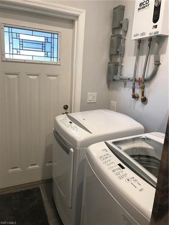 Full-size washer and dryer in half bath.  Door to carport, instant hot water heater.