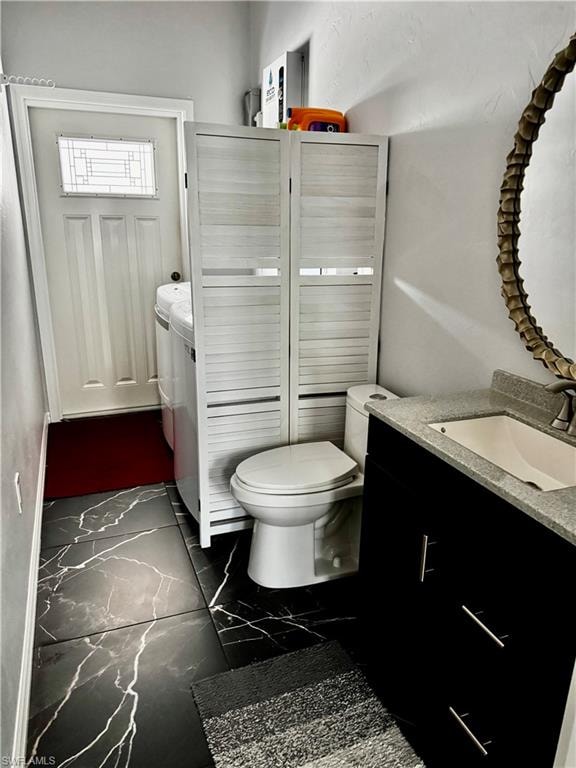 half bath with laundry and door to carport
