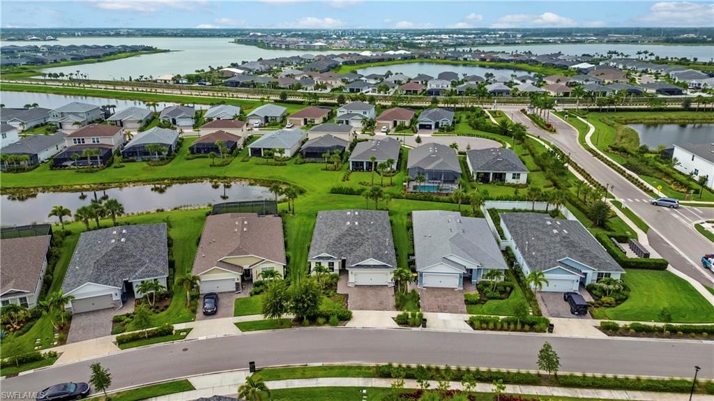 Residential community with water features and mature landscaping