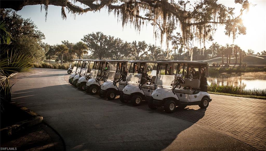 There is something special about starting the day at Verandah. Morning sunlight filters through centuries-old oak trees while golfers prepare for another round on the community's renowned courses. This image captures the relaxed rhythm of life here, where recreation, friendship, and natural beauty come together in a setting unlike any other.