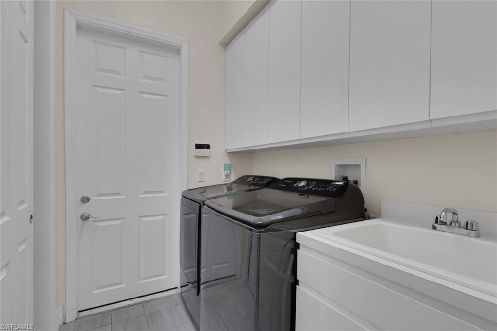Newer washer/dryer and set tub.  Pantry and ample cupboards.