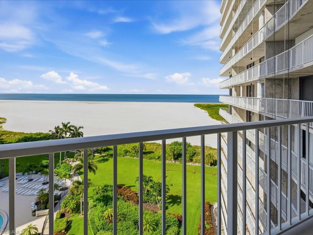 Expansive water frontage with a sandy beach and open water