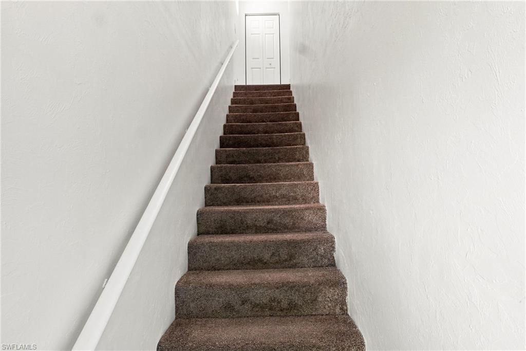 Stairs from front door/garage to unit