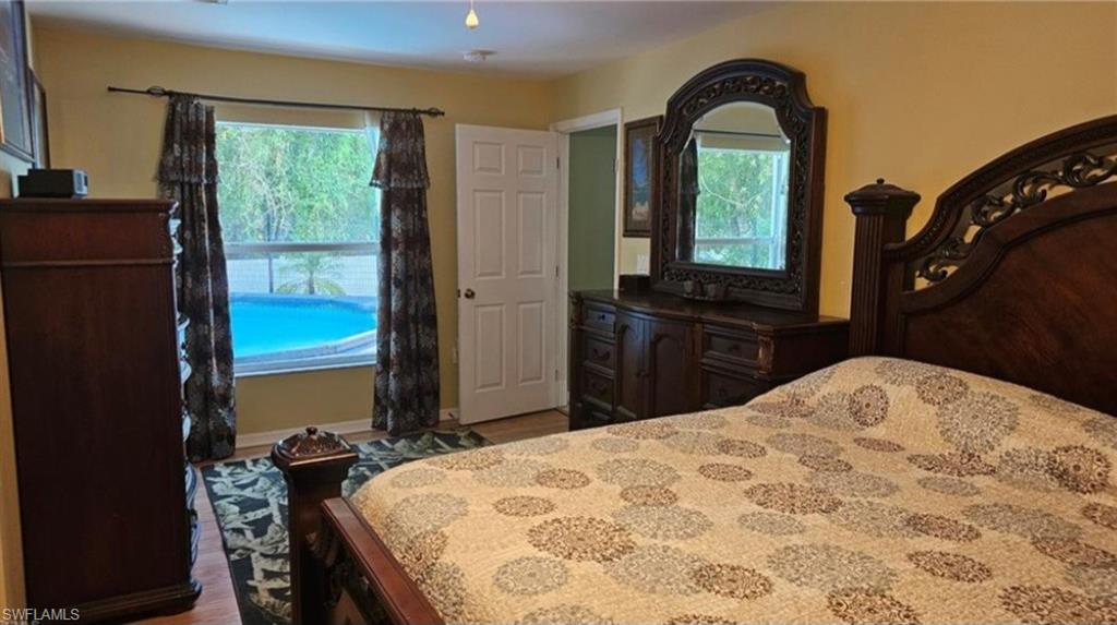Master Bedroom overlooking pool with large walk in closet