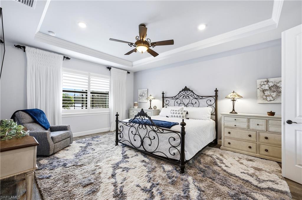 Primary Bedroom with view of lake