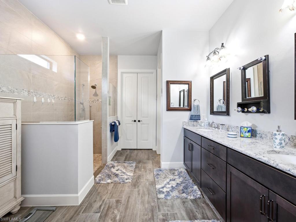 Primary bath with dual vanity and walk-in shower