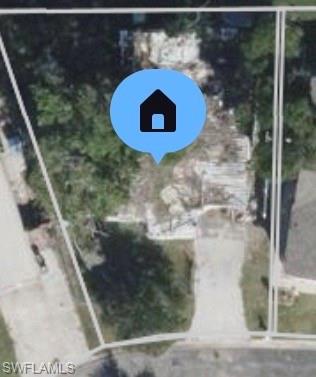Aerial Property Map. Satellite imagery depicting the property location and boundaries with geographic reference marker
