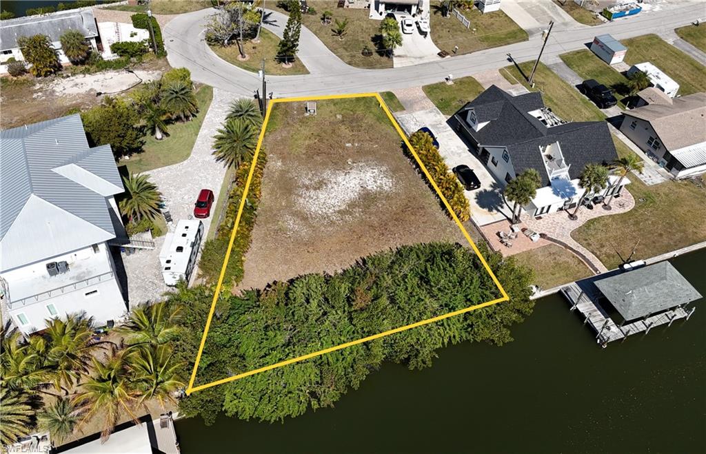 Aerial perspective of suburban area with property boundaries highlighted