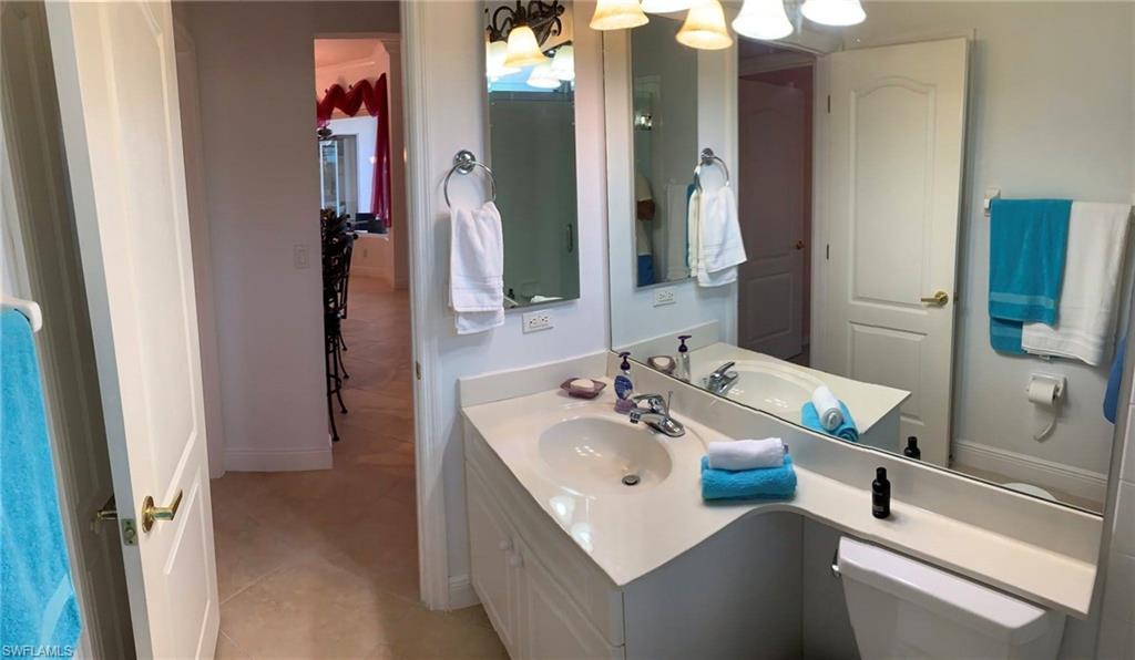 Bathroom featuring vanity and tile patterned flooring