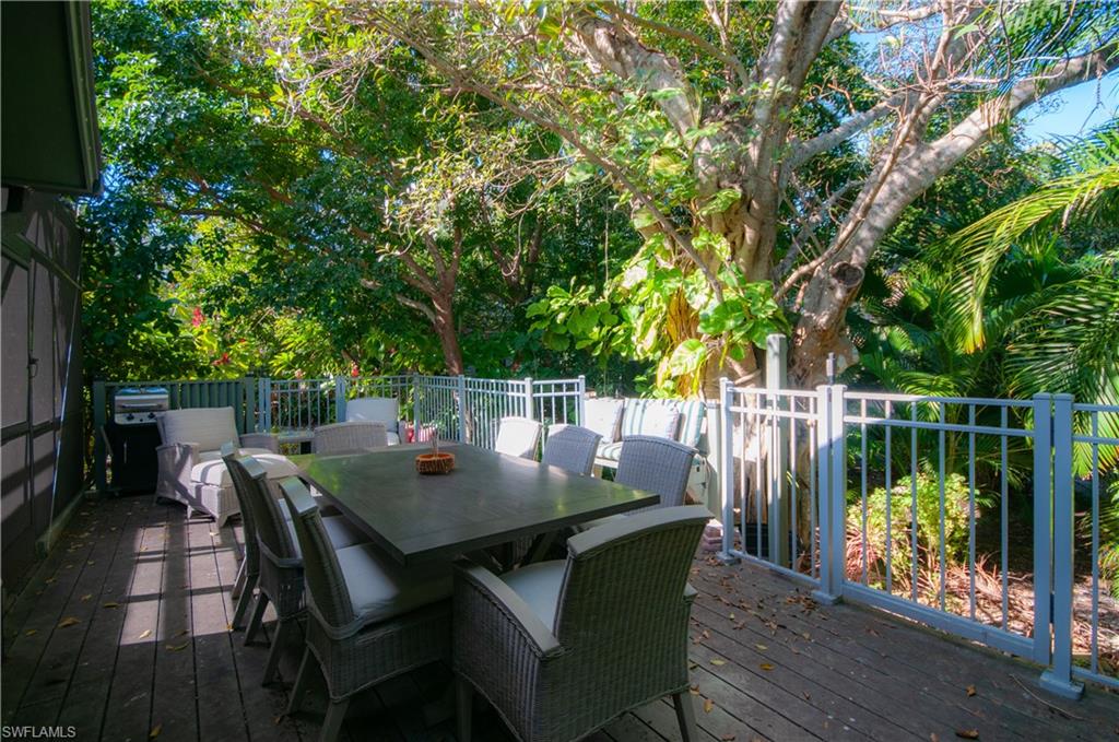Wooden terrace with outdoor dining area