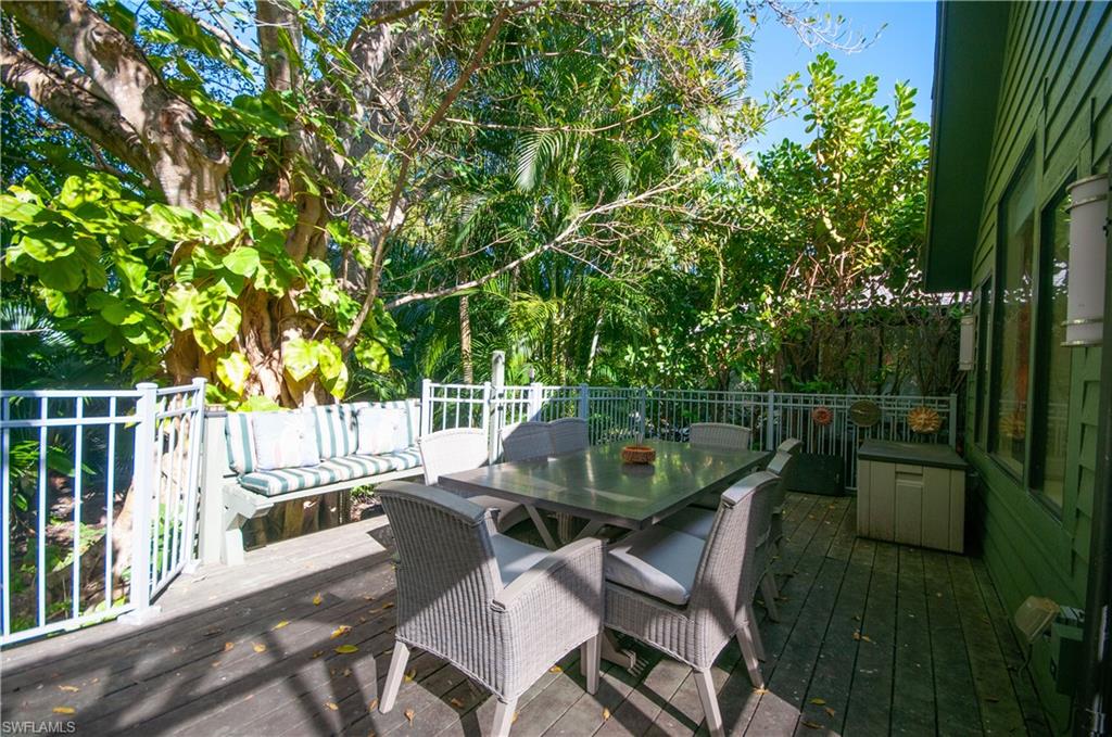 Wooden deck with outdoor dining area