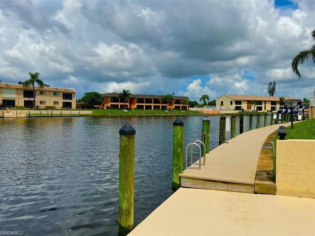 Waterfront dock with composite decking and aluminum pilings, offering direct water access