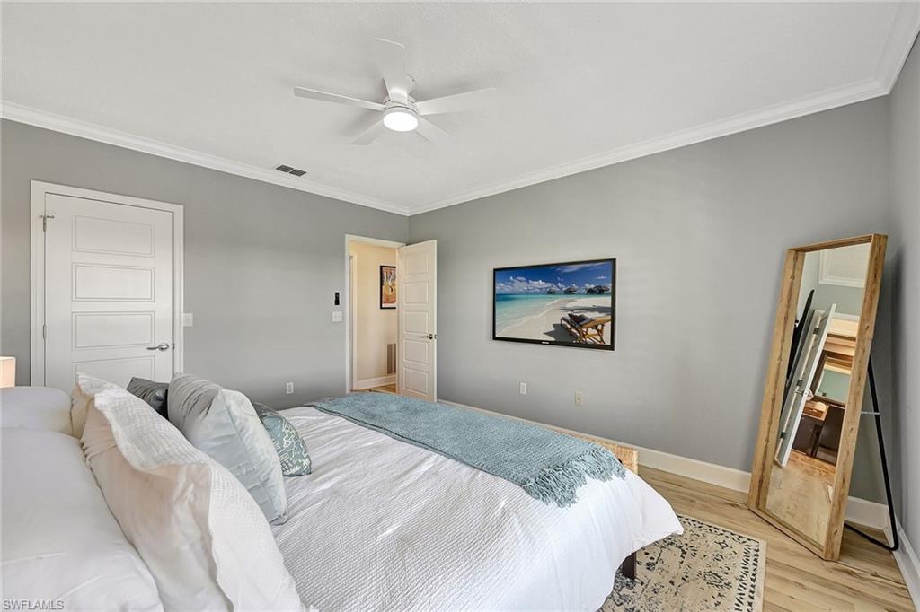 Guest Bedroom 1 with Mounted TV