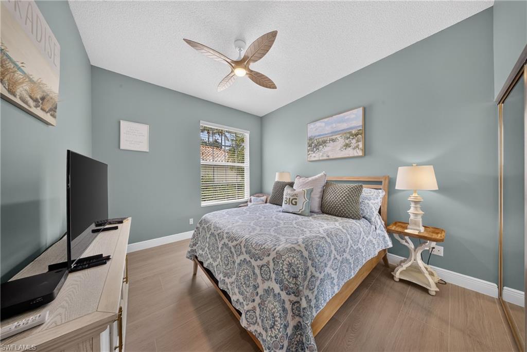 Neutral tone walls featuring wood-finish flooring