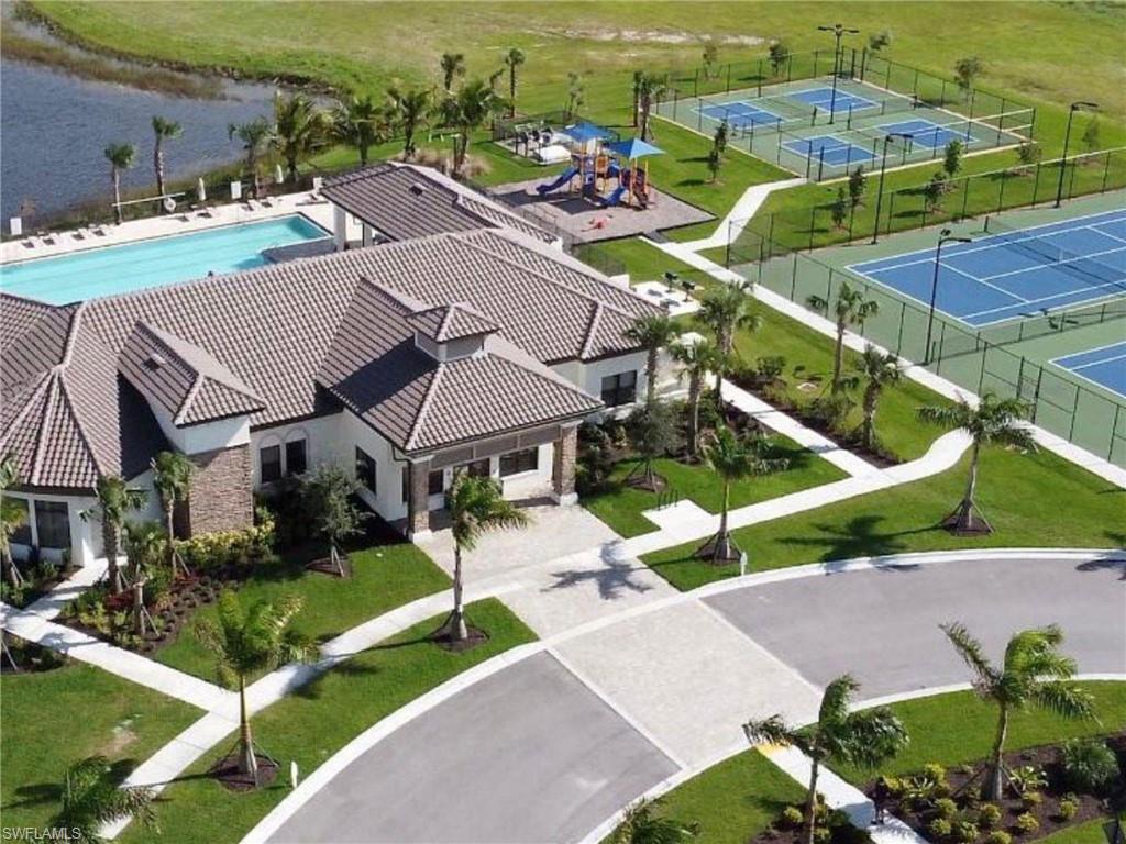 Aerial view showcasing the home’s location within the beautifully maintained Portico community.