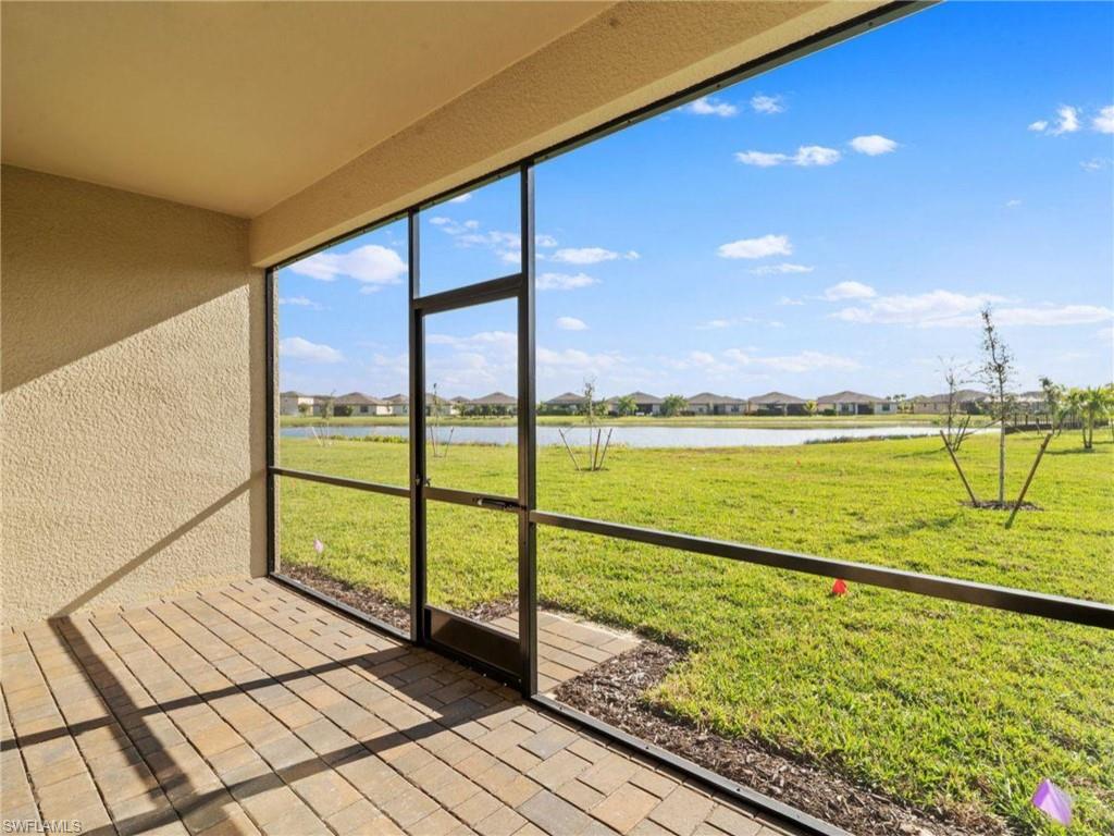 Relax on the screened lanai while enjoying peaceful lake views.