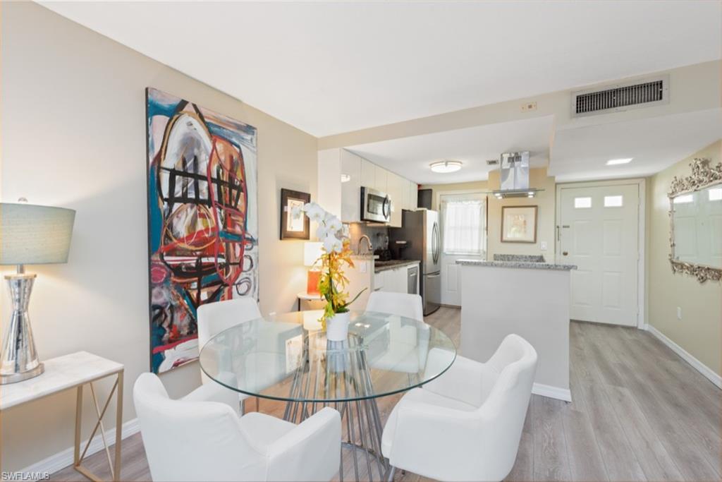 Dining room featuring light hardwood / wood-style floors and sink