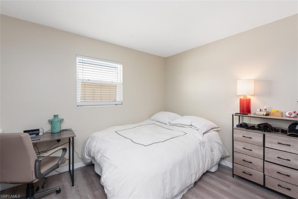 Bedroom with light wood-type flooring
