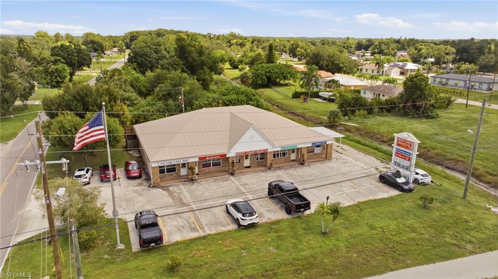 Commercial building with a metal roof and brick facade