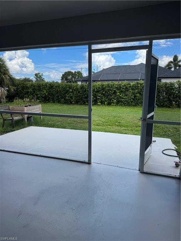 View of back yard from lanai w/extra space for grill and chairs