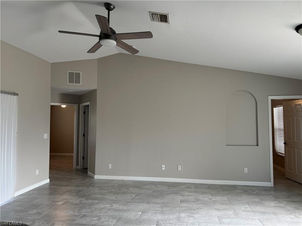 view of family room from the open kitchen & ceiling fan