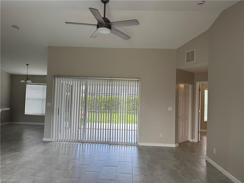 Family room featuring double sliders to the screened lanai