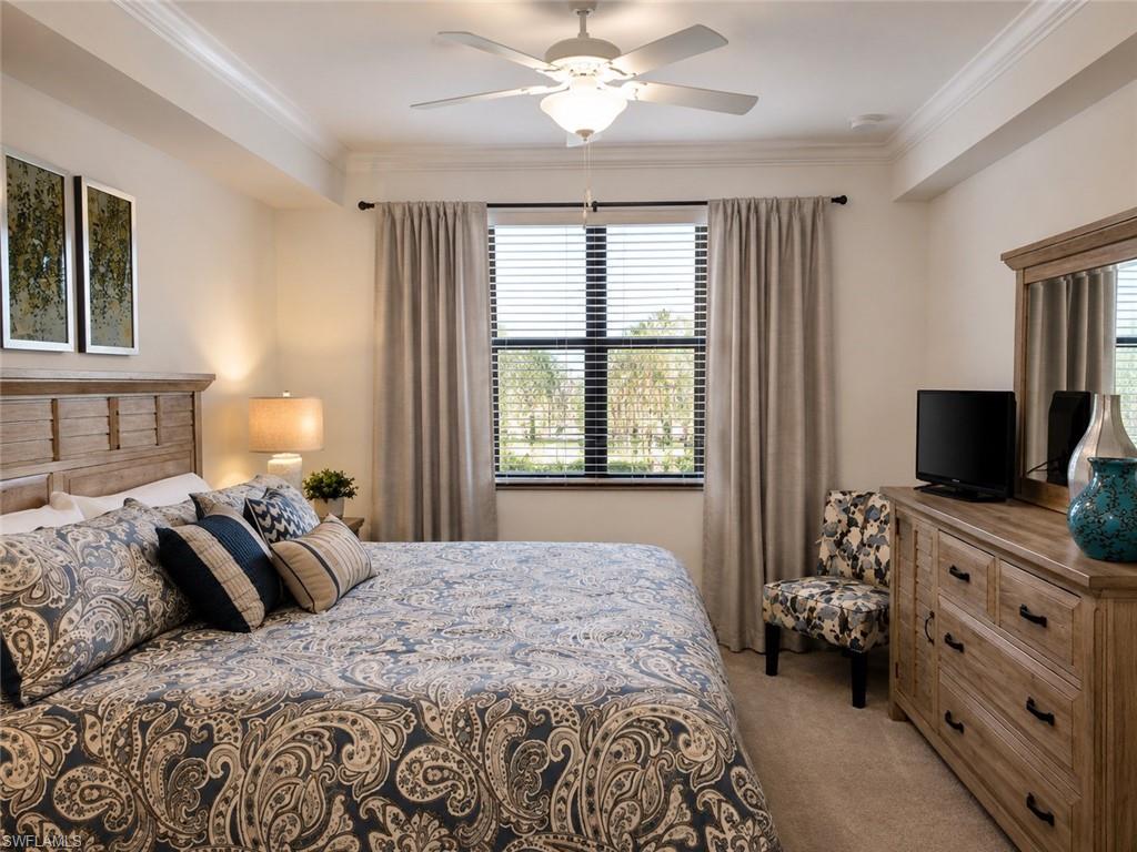 Recessed lighting, crown molding, ceiling fan, window with blinds, and carpeted flooring