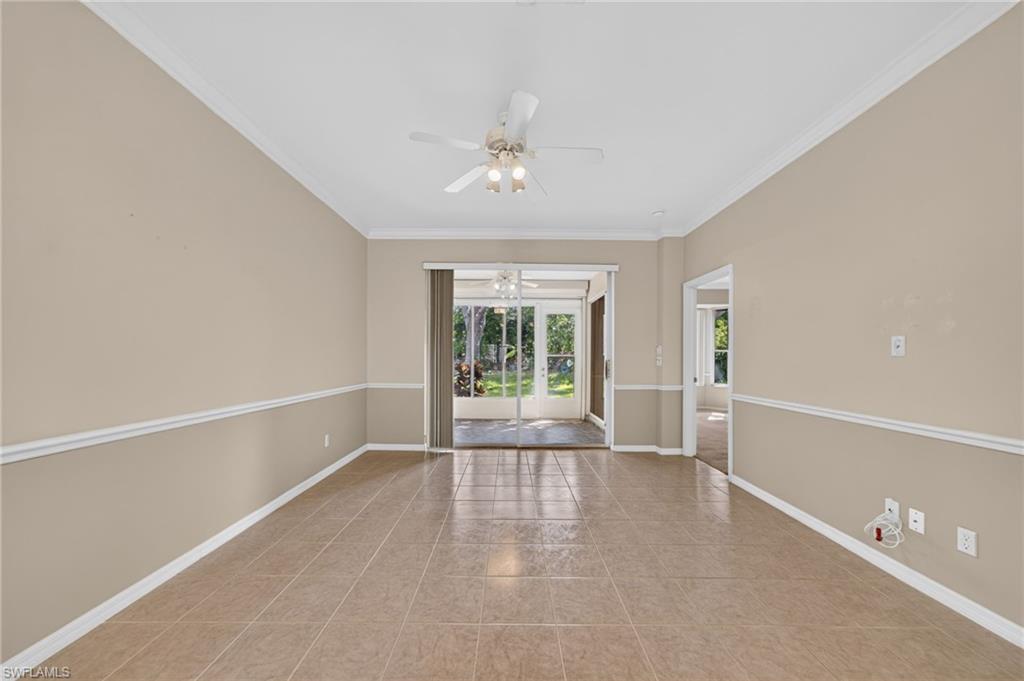 Livingroom with sliders leading out to your second lanai which is enclosed.