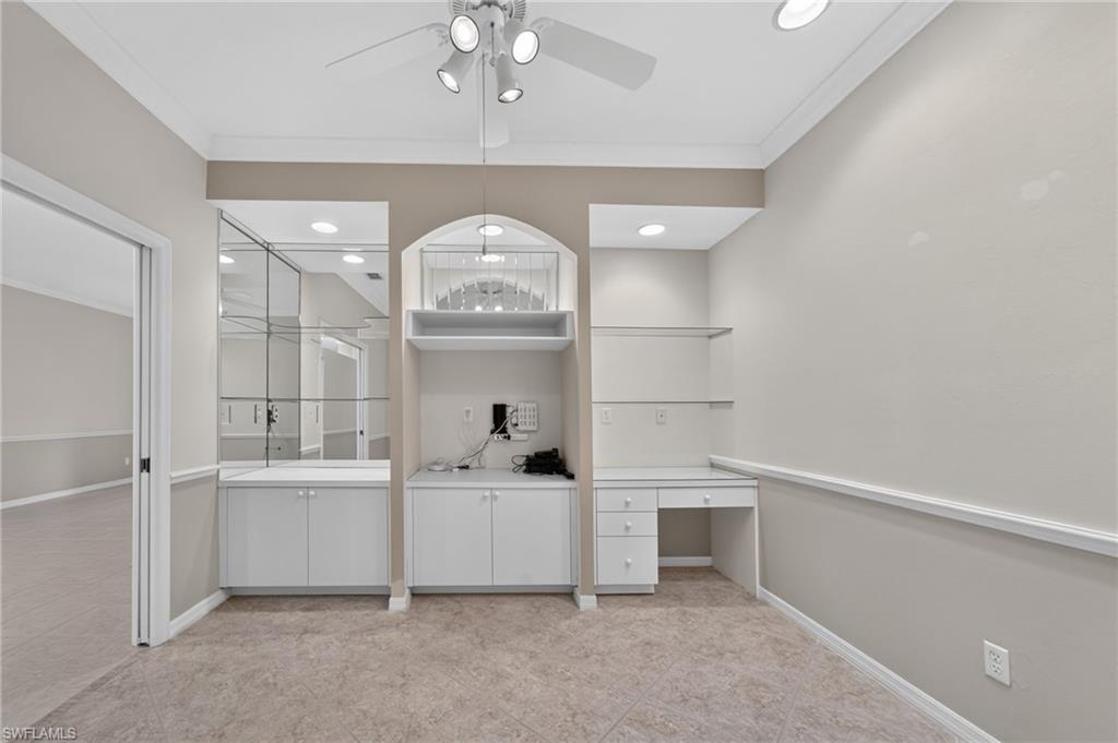 Den with built-ins and desk area