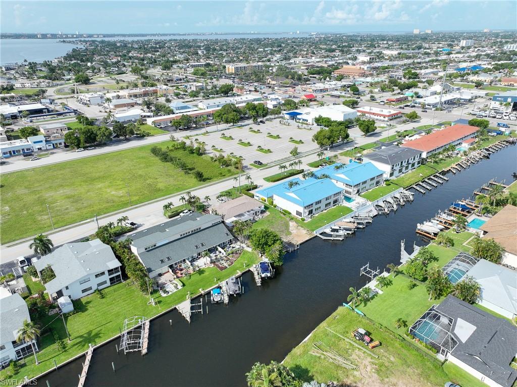 Waterfront properties with direct canal access, private boat docks, and screened-in swimming pools