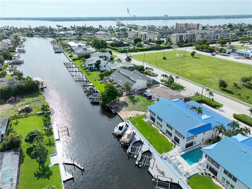 Waterfront property with private boat docks, canal access, and a swimming pool