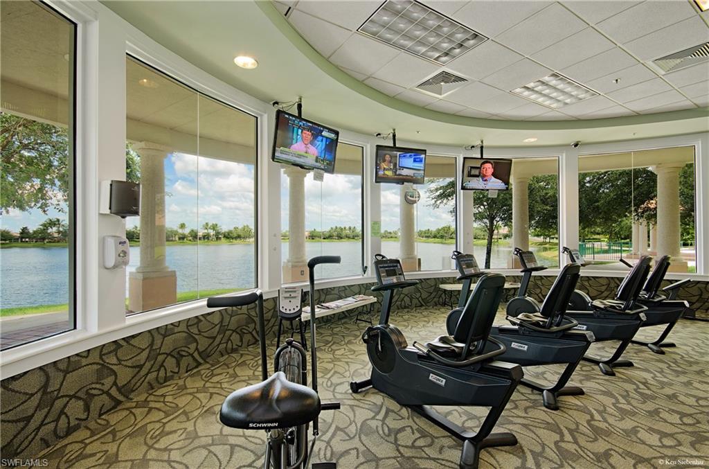 Gym featuring visible vents and carpet floors