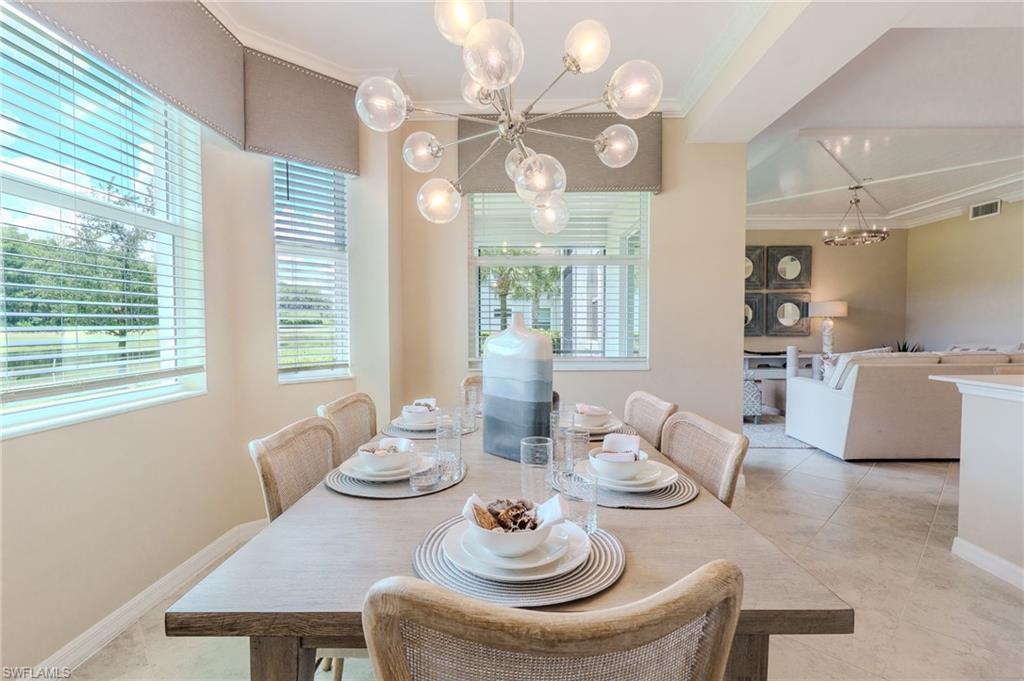Recessed ceiling, neutral wall paint, and light tile flooring
