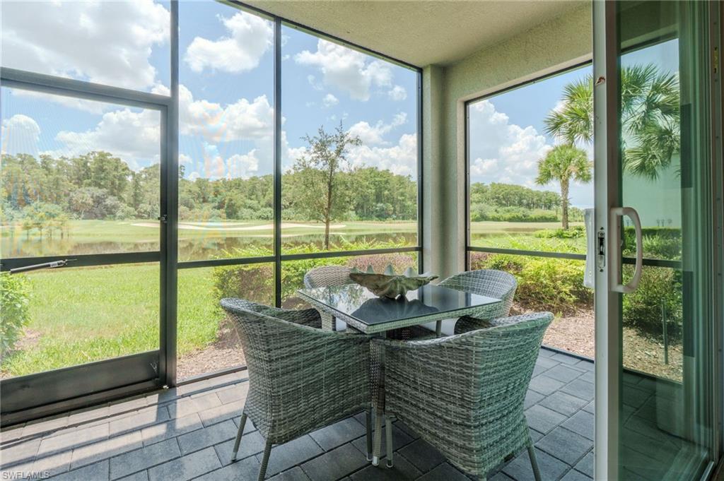 Screened patio with paver flooring and sliding glass door