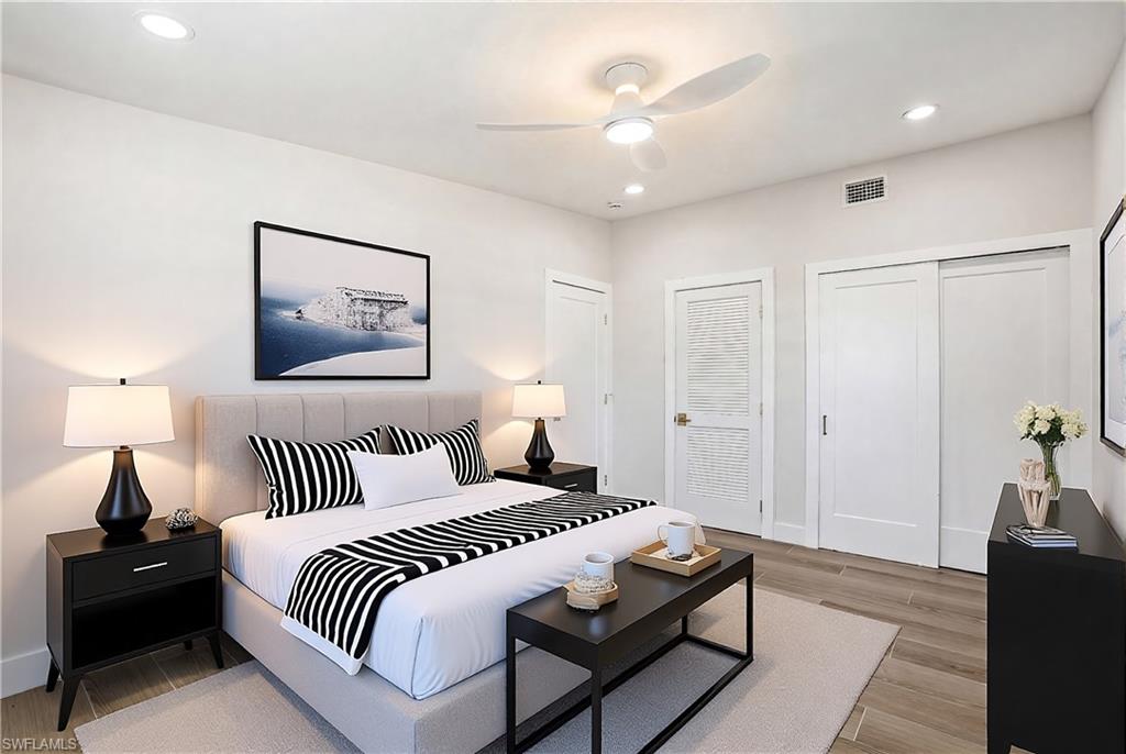 VIRTUALLY STAGED This room features light-colored walls and wood-look flooring, complemented by recessed lighting and a ceiling fan - Virtually Edited Image
