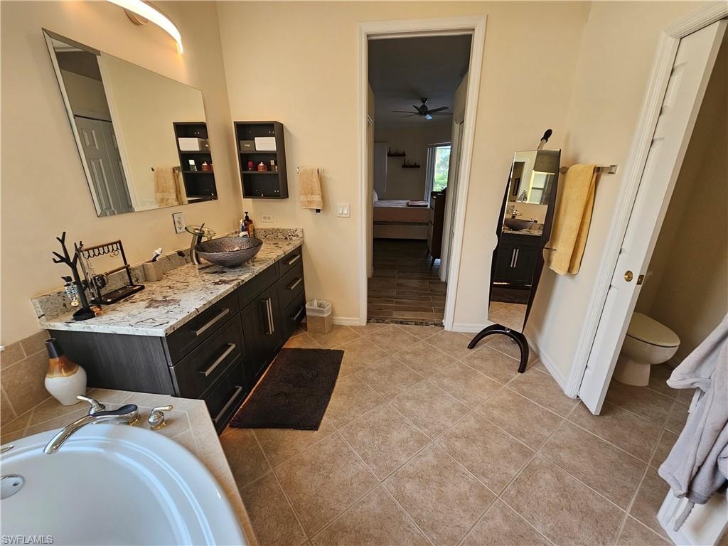 Master bath with separate water closet and walk in shower plus garden tub