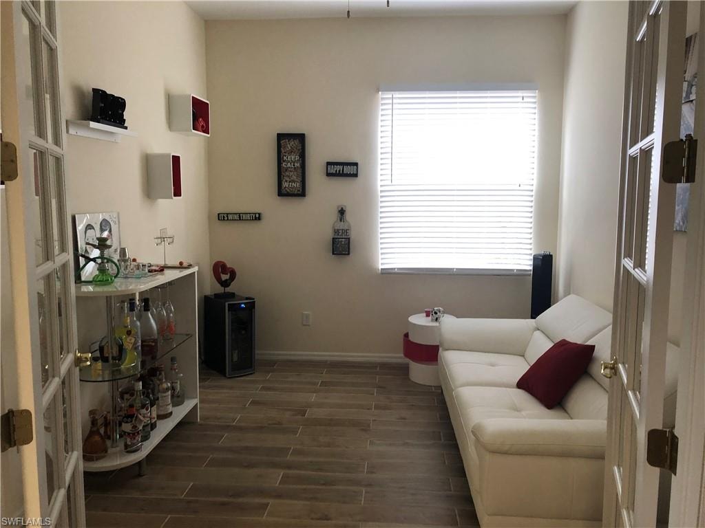 Flex room with french doors and tiled floors