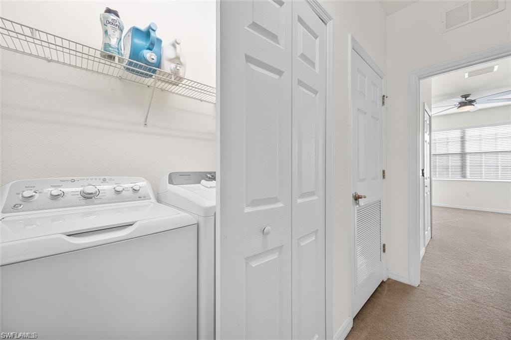 Dedicated laundry area with a wire shelving unit