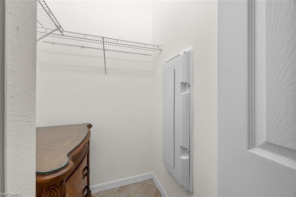 Wire shelving system and tile flooring