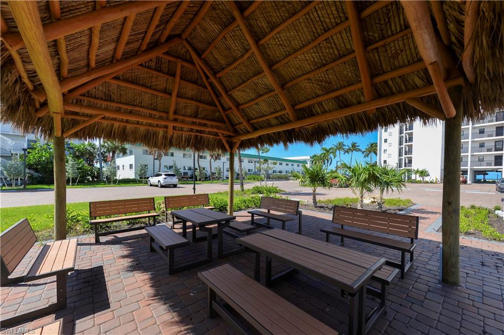 Exterior Community Front of Building Tiki Patio with grill area adjaccent