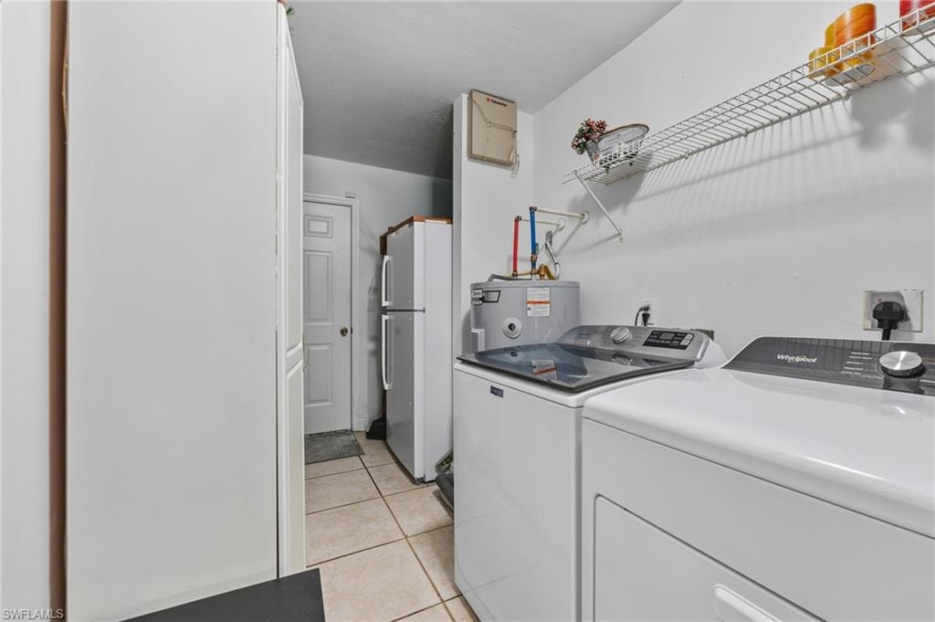 White appliances with top-load washer and front-load dryer