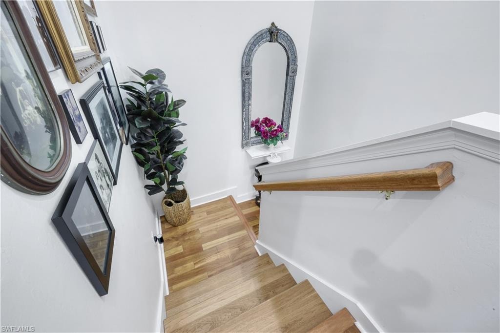 Wooden stairway up to second floor Ensuites